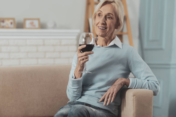 Delighted joyful woman having wine - Foto, immagini