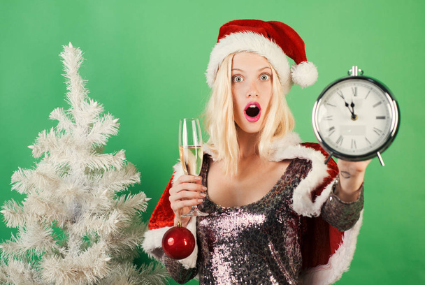 Christmas clock and time christmas. Glamour celebration and Christmas woman dress. Merry christmas and Happy new year. New year gift. - Фото, зображення