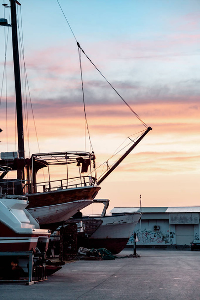 fishing boats in the fishing harbor. Sunset. - Фото, изображение