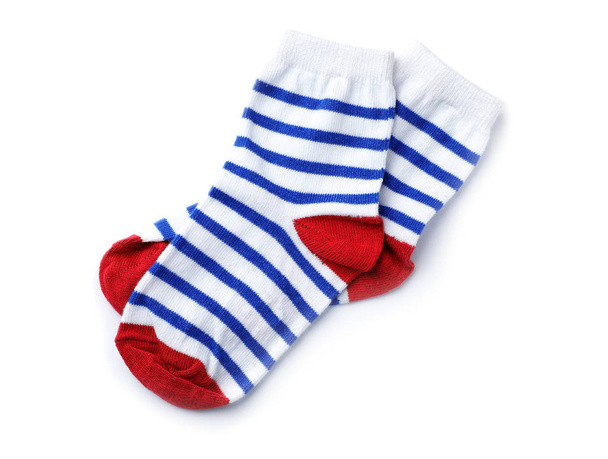 Cute child socks on white background, top view - Foto, Imagen