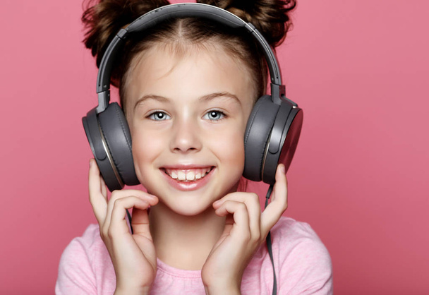  happy girl  with headphones listening to music - Фото, изображение