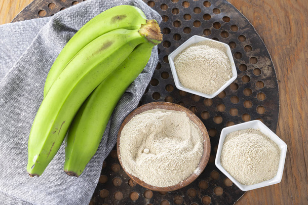 green banana flour on the table. - Photo, Image