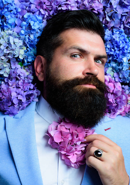 Vogue flower bow-tie. Man in blue suit. Bearded man and flower beard. Spring necktie. Elegant business man. Classical costume. - Fotó, kép
