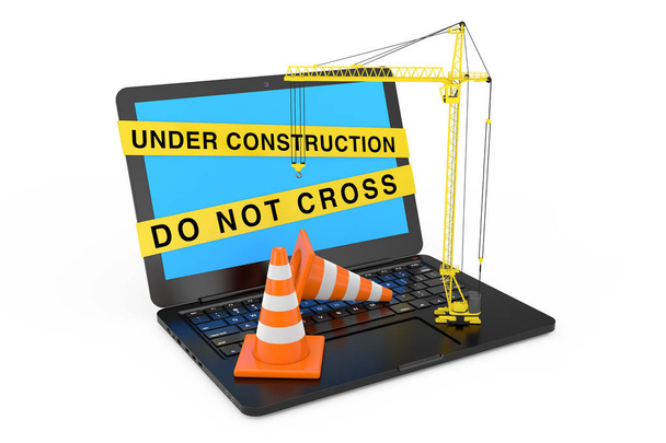 Orange Traffic Cones and Yellow Tower Crane over Laptop with Under Construction Tape on a white background. 3d Rendering  - Photo, Image