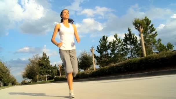 Caucasian Girl Jogging Outdoors - Footage, Video