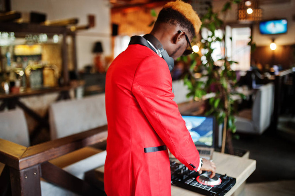 Fashion african american man model DJ at red suit with dj controller.  - Φωτογραφία, εικόνα