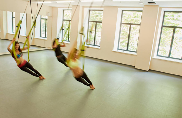 Antigravity yoga exercises - Foto, immagini