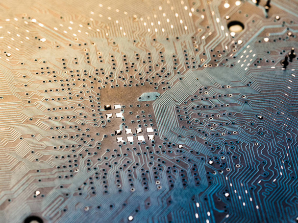 Blue computer circuit board Close-up. Electronic components of micro chip inside the computer macro. - Foto, immagini