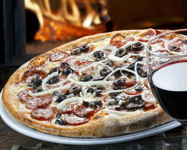 Pepperoni pizza and red wine - Photo, image