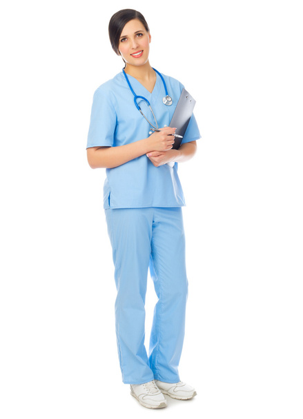 Young doctor with clipboard - Φωτογραφία, εικόνα