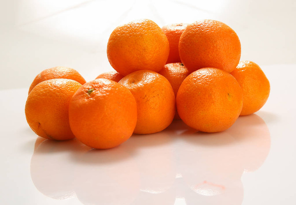 Citrus, tangerines on a white background. - Photo, Image