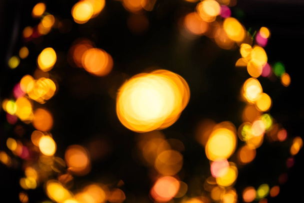 Christmas light background with blurred bokeh. - Foto, Bild