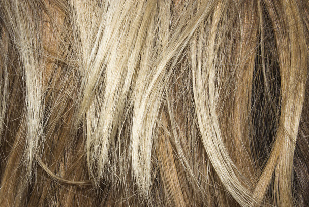 Χρωματιστά γυναικεία μαλλιά.Ιστορικό των έγχρωμων μαλλιών.Λείπουν. - Φωτογραφία, εικόνα