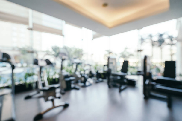 Abstract blur and defocused fitness equipment in gym room interior for background - Photo, Image