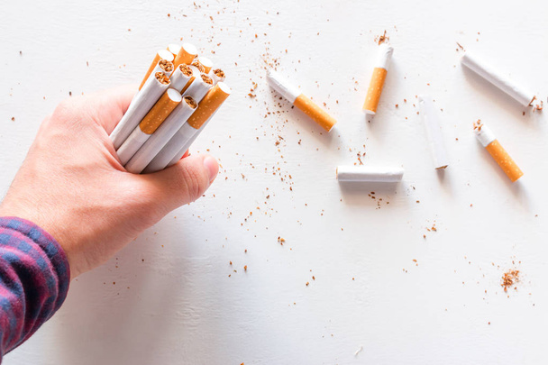 smoker breaks cigarettes. concept stop smoking - Foto, Bild