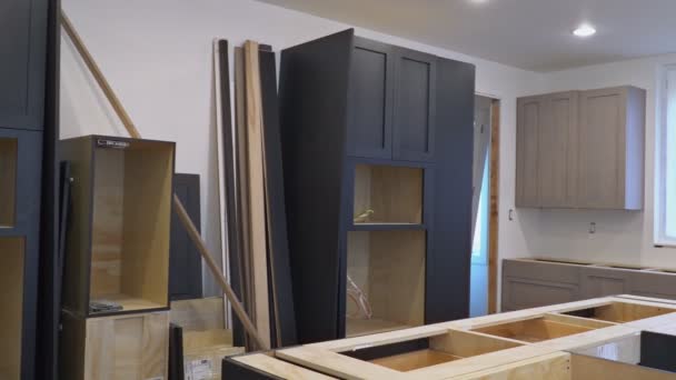 Installation of kitchen installs kitchen cabinet. Interior design construction kitchen - Footage, Video
