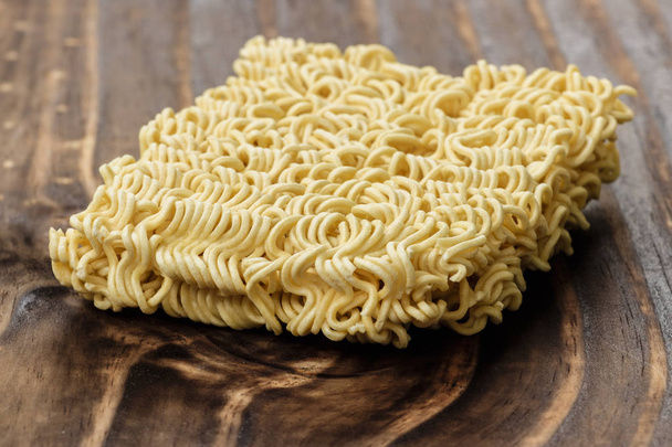 close-up on instant noodles on wood - Photo, Image