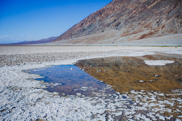Vibrant view of Badwater basin, endorheic basin in Death Valley National Park, Death Valley, Inyo County California, US - Foto, imagen
