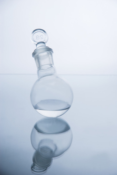 Laboratory glassware over white - Fotografie, Obrázek