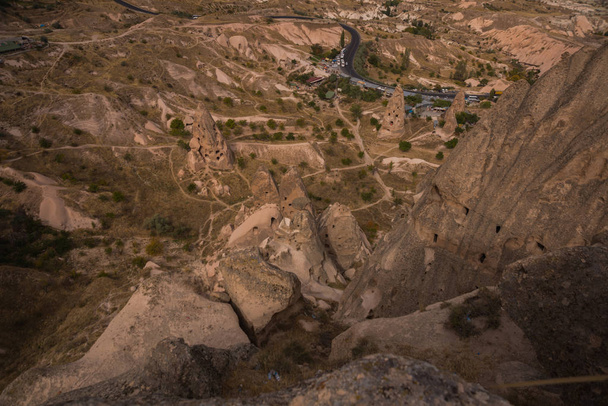 Travel Turkey - above view of Uchisar town and roads in valley in Nevsehir Province in Cappadocia in spring. - Foto, imagen
