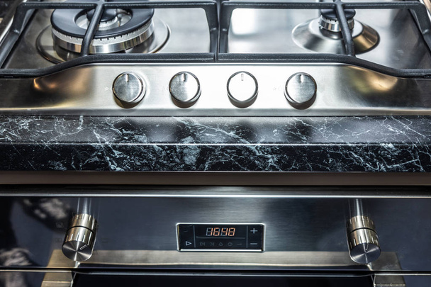 new gas stove with marble decor elements, background image - Photo, Image