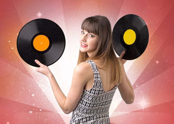 Lady holding vinyl record - Фото, зображення