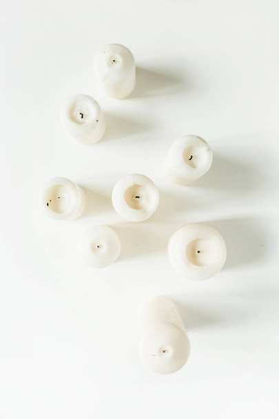 Candles on white background. Flat lay, top view. - Photo, Image