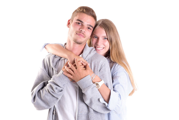 teenage couple posing isolated in white - Fotó, kép