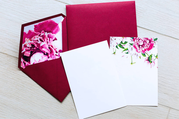 stylish envelopes and wedding invitations on a wooden surface - Photo, Image