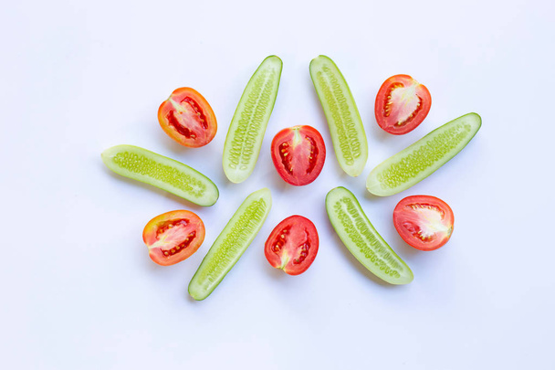 Tomatoes, Cucumbers, Natural ingredients for homemade skin care on white. - Valokuva, kuva