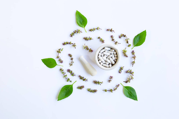 Herbal Medicine Capsules Pills with flower of Sweet Basil - Foto, Bild