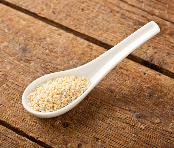 Sesame seeds in the spoon - Photo, Image