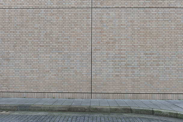 Straßenmauer Hintergrund, Industrieller Hintergrund, leere Grunge urbane Straße mit Lagerhaus Ziegelmauer - Foto, Bild