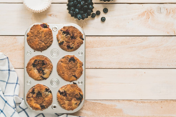 Flat lay. Homemade blueberry muffins made with organic ingredients. - Photo, Image