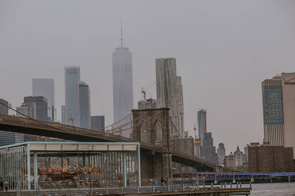 Brooklyn Bridge in New York City at dawn. - 写真・画像