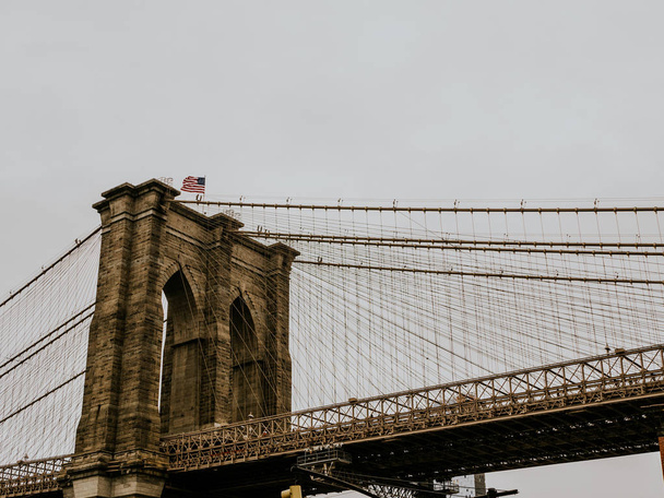 Brooklyn Bridge in New York City at dawn. - Фото, изображение