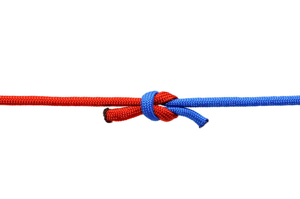 Knot  on a cord isolated on a white background . - Photo, Image