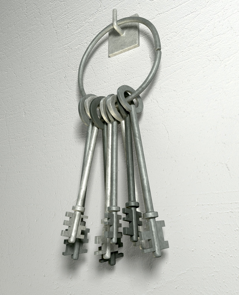 Ключи на кольце, висящем на стене
 - Фото, изображение