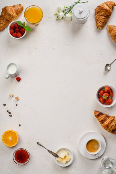 Continental breakfast captured from above - space for text - Фото, изображение