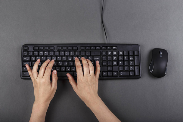 female hands on a black computer keyboard. business planning. work with office equipmen - Foto, Imagem