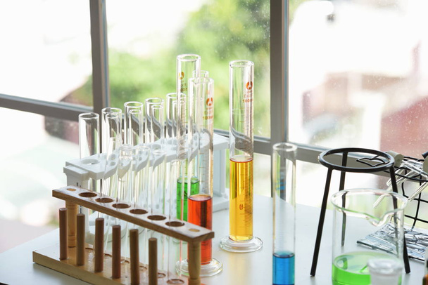 Test tubes on table in laboratory - Photo, image