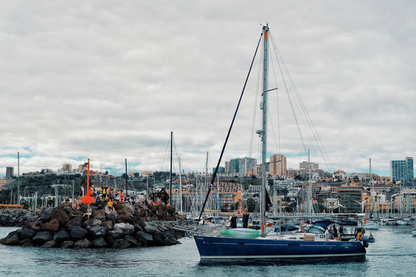Las Palmas, Gran Canarias, Canary Islands / Spain - NOV 25 2018 : sailing boats are leaving the city marina for the atlantic crossing regatta race ARC 2018 on a sunny day - 写真・画像