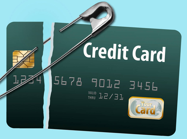 A damaged and mended credit card illustrates repairing your damaged credit rating. - Photo, Image