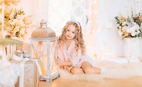 Beautiful Little Girl in Christmas interier - Photo, image