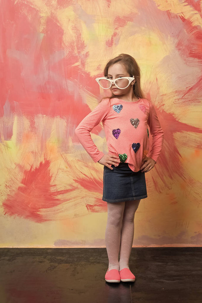 Small girl in fashionable summer glasses. - Фото, зображення