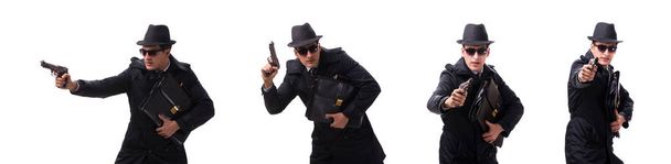 Uomo spia con pistola isolata su sfondo bianco - Foto, immagini