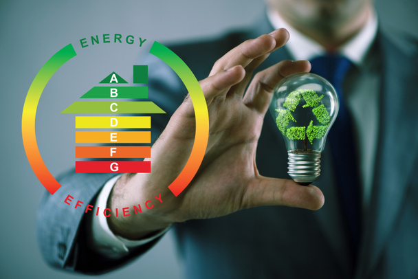 Бізнесмен в концепції енергоефективності
 - Фото, зображення