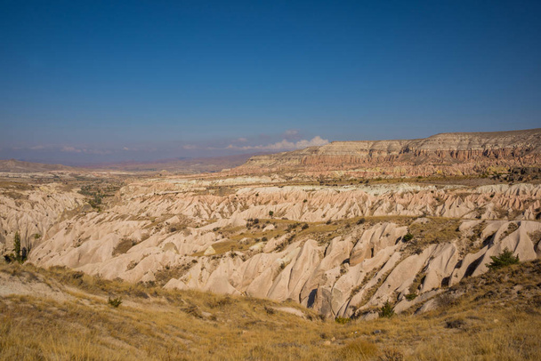 Beautiful landscape view of the white mountain and fabulous valley. Goreme national park, Aktepe Hill, Cappadocia, Turkey. - Φωτογραφία, εικόνα