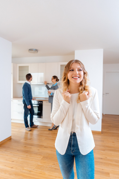 Woman raving about the apartment she and her man are going to rent - Photo, Image