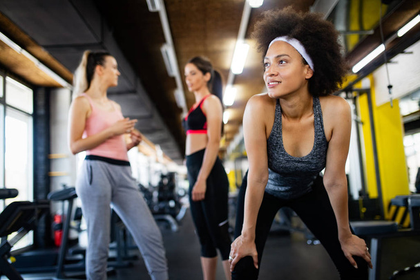 Close up image of attractive fit black woman in gym - 写真・画像